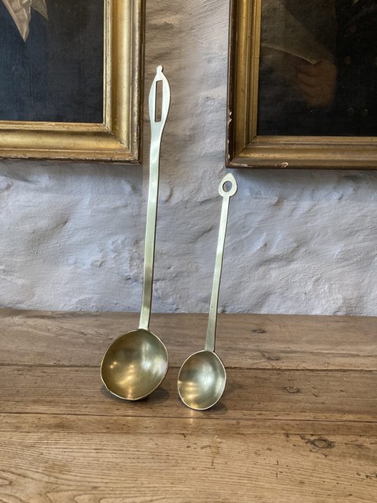 Two brass ladles