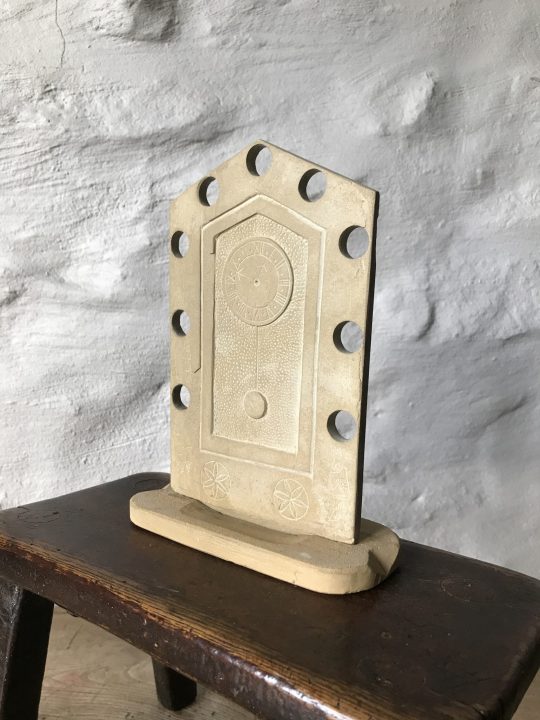 Stone folk art watch holder