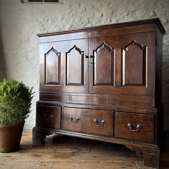 A Small Welsh oak cupboard with drawers